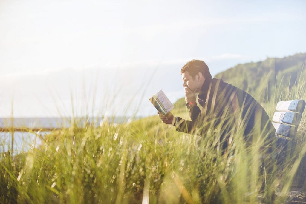 man reading bible